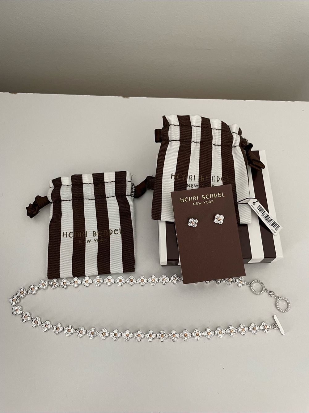 Henri Bendel earrings and necklace set with box and two pouches. NWT!